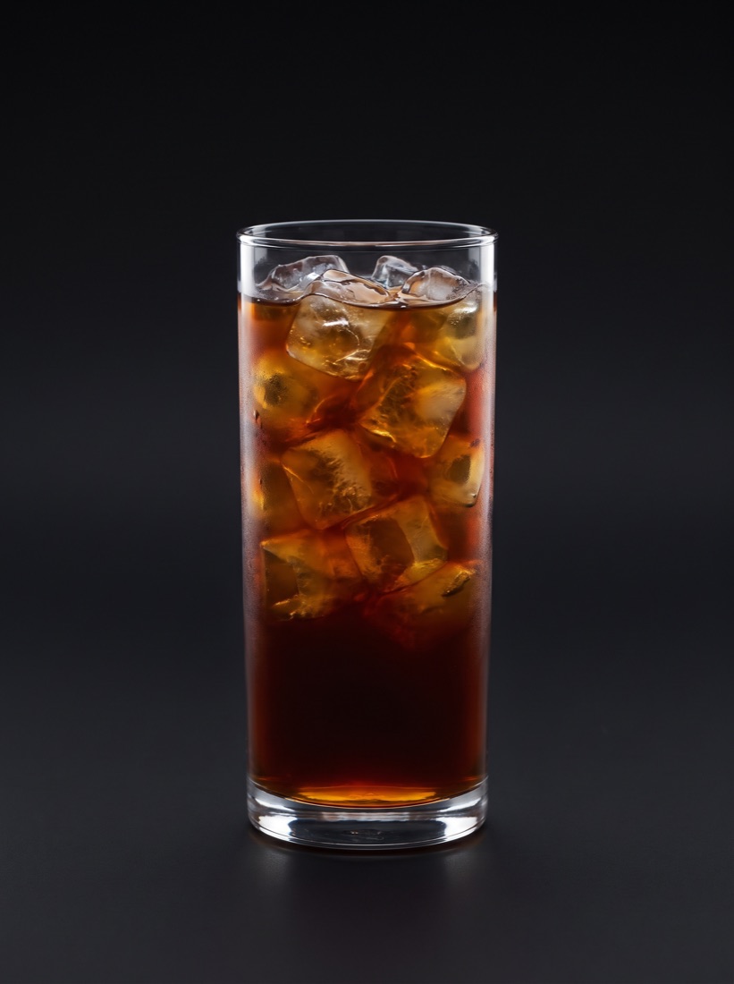 A glass of cold brew, darkening as the ratio changes